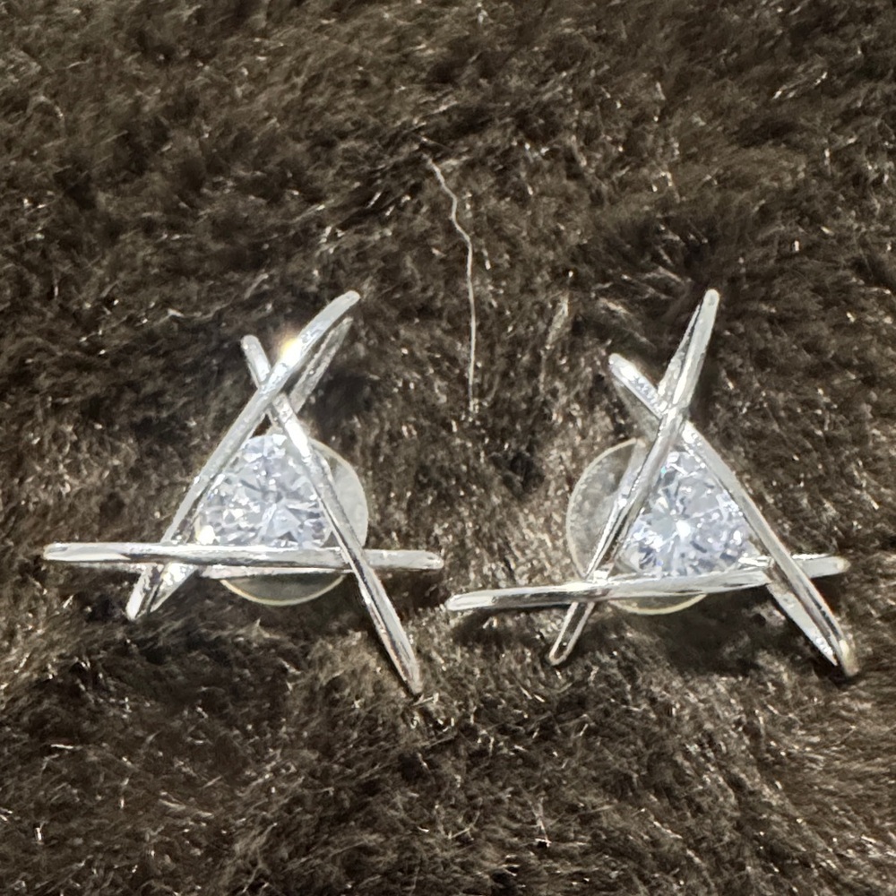 Unreal Fur Silver Crisscross Earrings